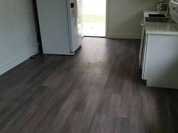 View from Den/Dining Room into Kitchen