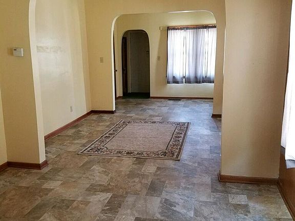 Living room, rug was left by previous owner doesn't cover an