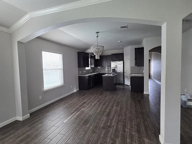 living area has crown moulding