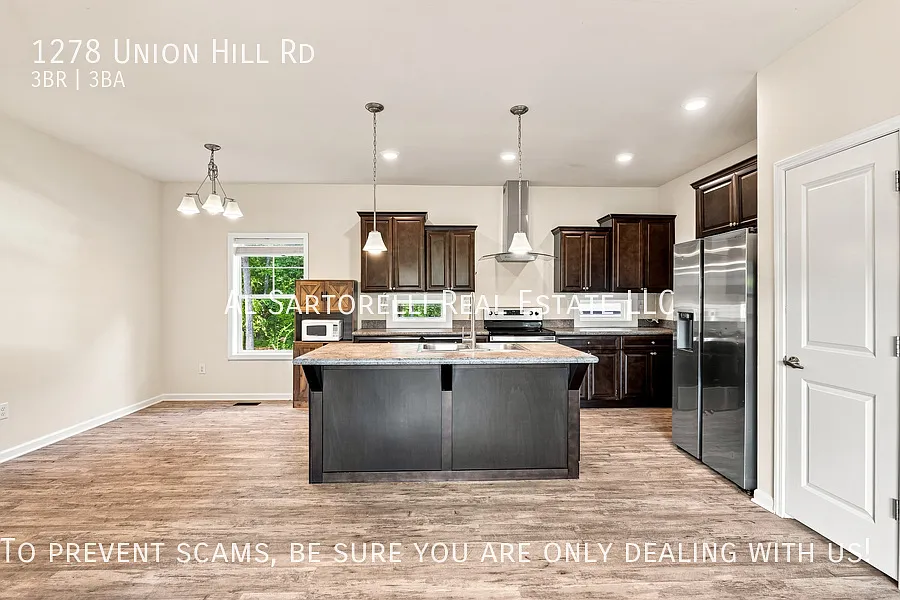 3 Bedroom Home with Open Floor Plan & Fenced Backyard — Photo 3