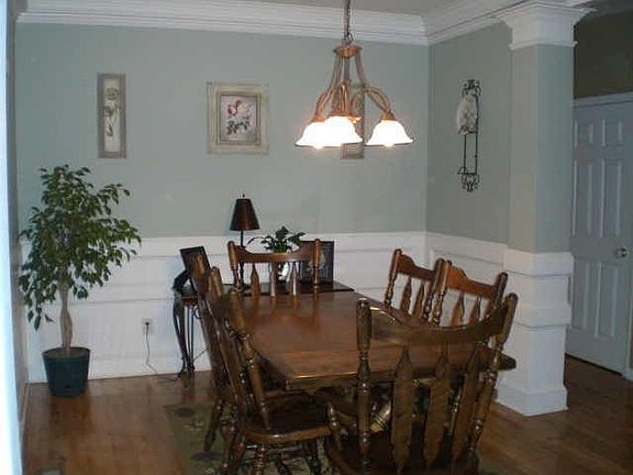 Formal dining room with hardwood floors...