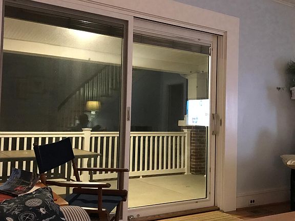 patio wraps around corner house on 2 sides