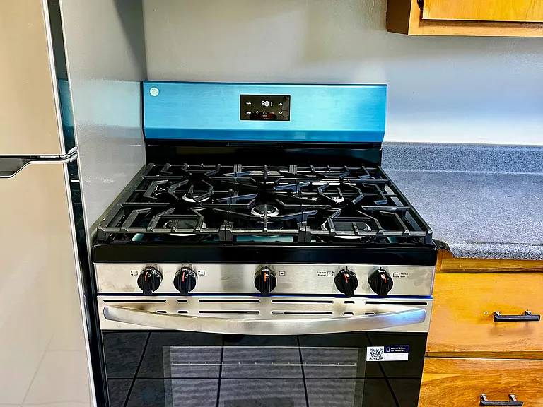 Brand new stainless steel refridgerator, stove oven, and range hood included.