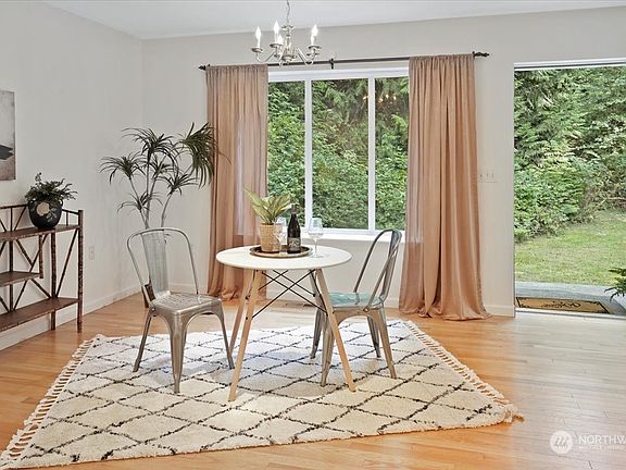 Dining room with door to large back patio and spacious yard>