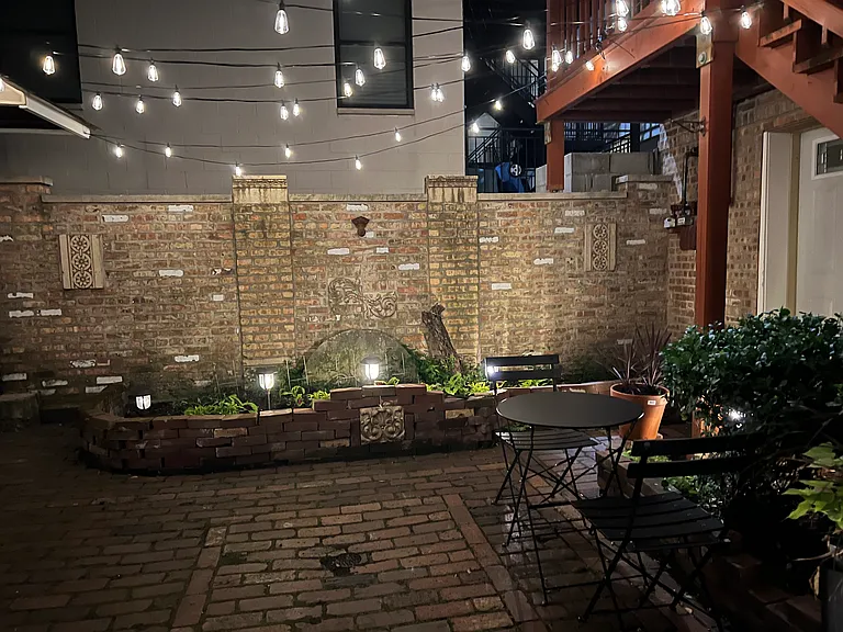 nighttime view of the courtyard - a romantic and charming vision best accompanied with a glass of red wine and some jazz