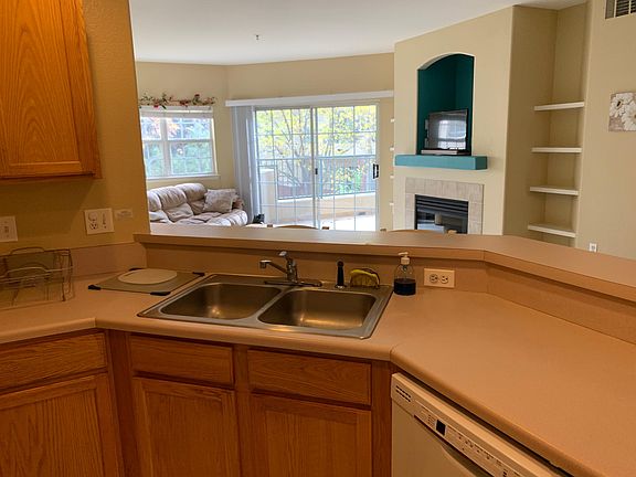 Kitchen looks out onto balcony