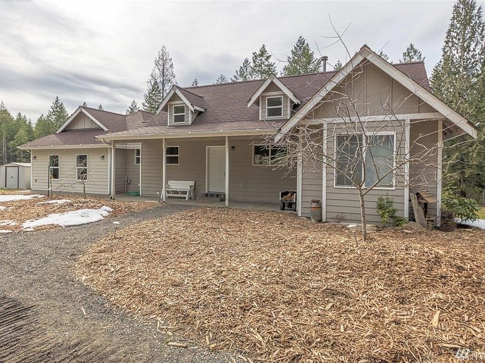 Set back from the road, this custom-built home is waiting for you. 