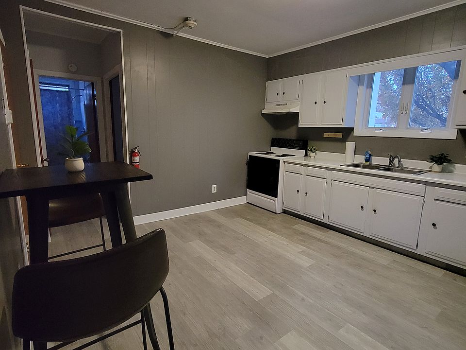 Kitchen different angle - table for 2 - new floors