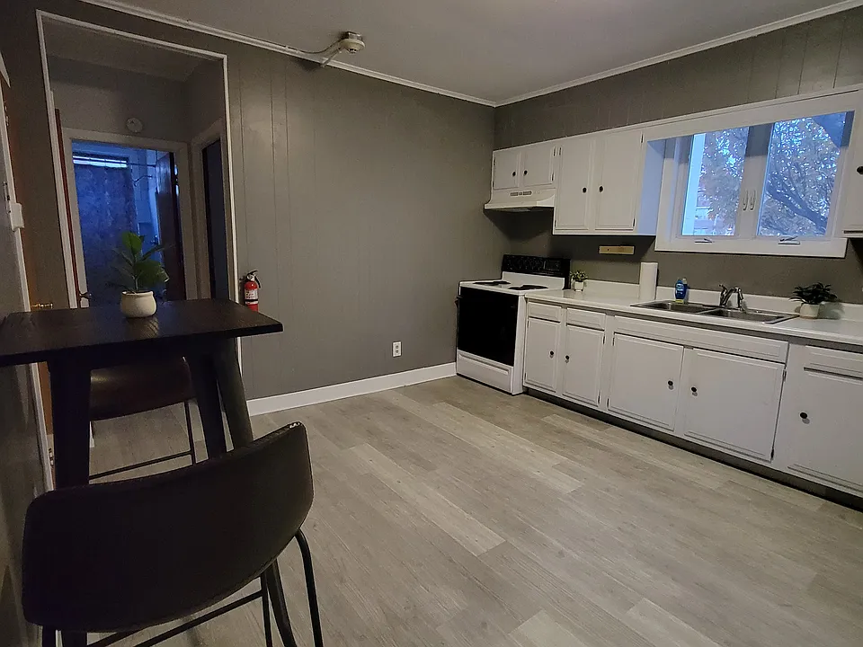 Kitchen different angle - table for 2 - new floors
