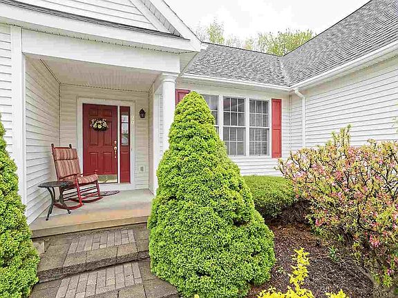 to the charming, covered front entrance
