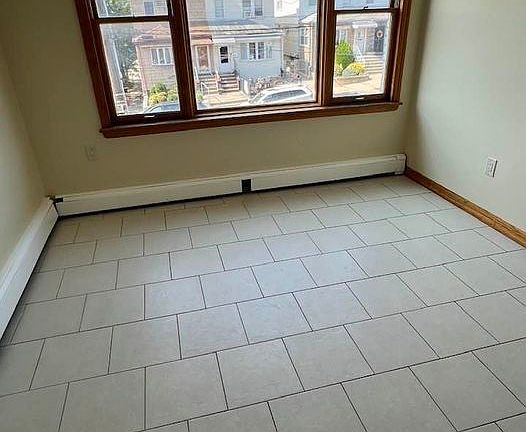 2nd image of 59-19 69th Pl Floor 2