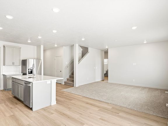 SLC_Willow_ 4281_Kitchen-Living-Area_C_3513-N-Browning-St-Eagle-Mountain-UT.jpg