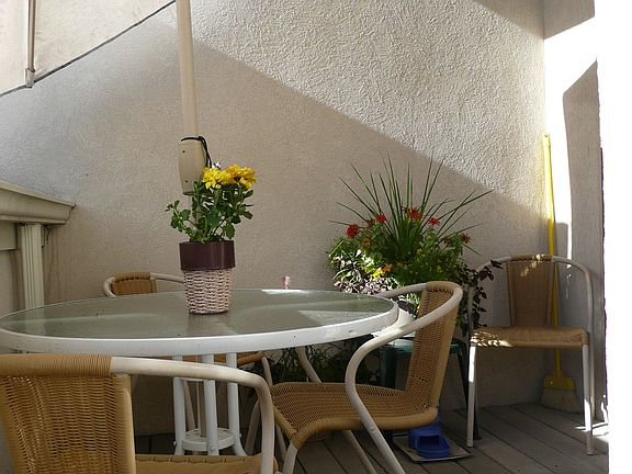 Patio between living room and garage