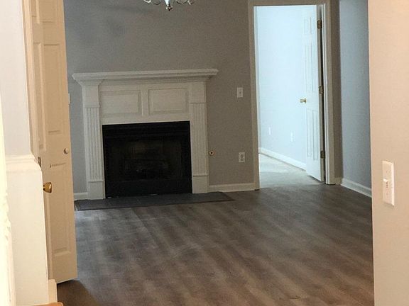 Living Room to Master Bedroom. Gas fireplace new LVP flooring.