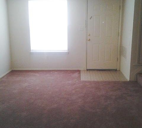 New carpet and vinyl foyer entry