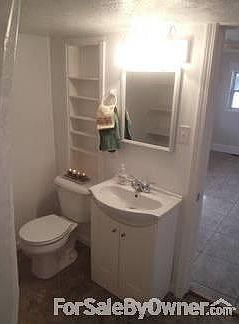 Bathroom
						:
						This is the completely gutted and remodeled bathroom view from the tub/shower.