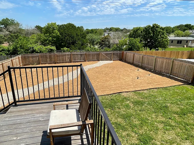 Enough grass to enjoy some yard games (grass runs the width of the property - just blocked in this picture by the deck), but not overkill.