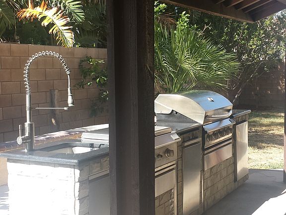 Coverered Tile Patio and Built-in BBQ grill set