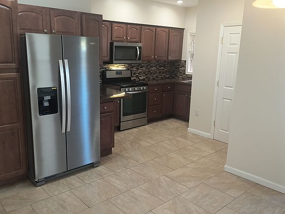 modern kitchen with new frig