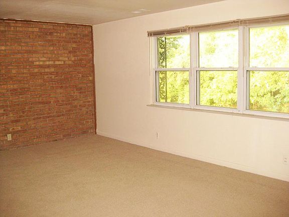 Living room with exposed brick