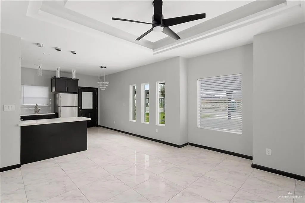 Building Photo - 1308 S Xanthia St #4