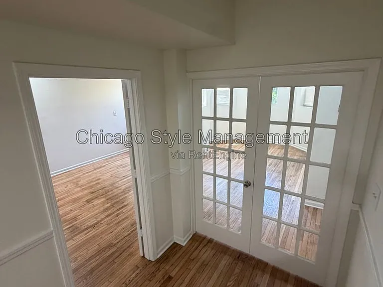 7833 S Colfax Ave — Photo 3