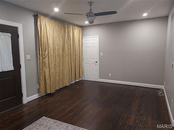 Door to upper bedroom off the Living room.