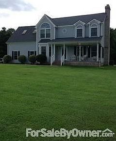 Front of House
						:
						Large front yd well off st w/ nice front porch looking to water view;on culdesac