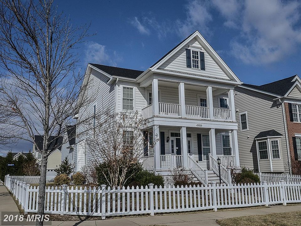 front porch and upper level balcony