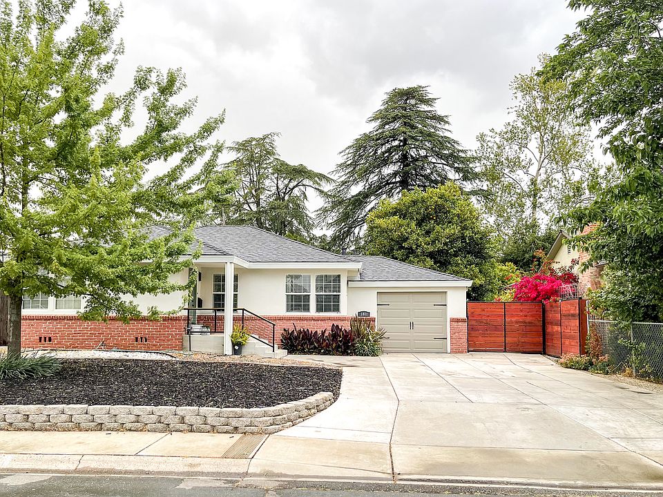 Large driveway fits 4 cars.