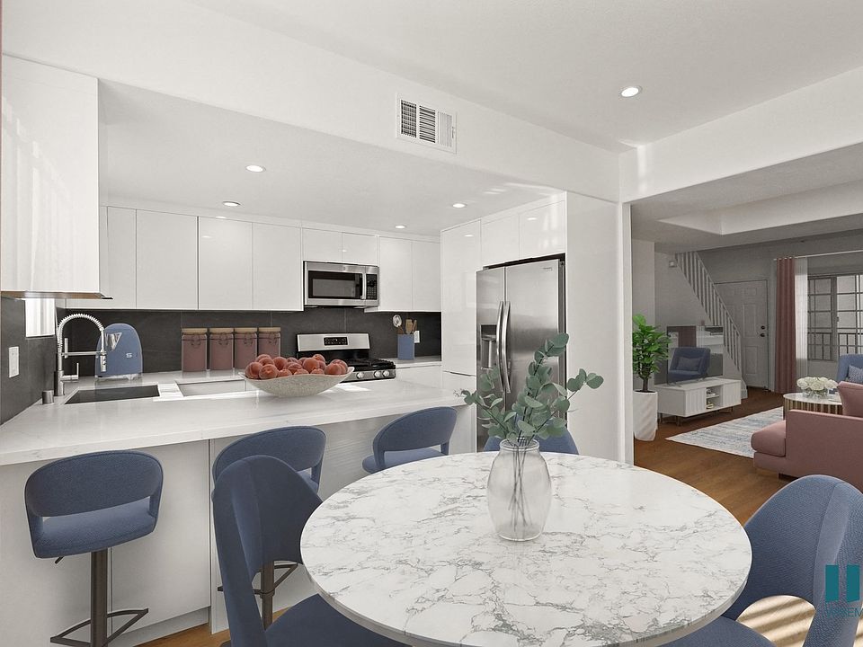 Open-Concept Kitchen, Dining, and Living Room Space