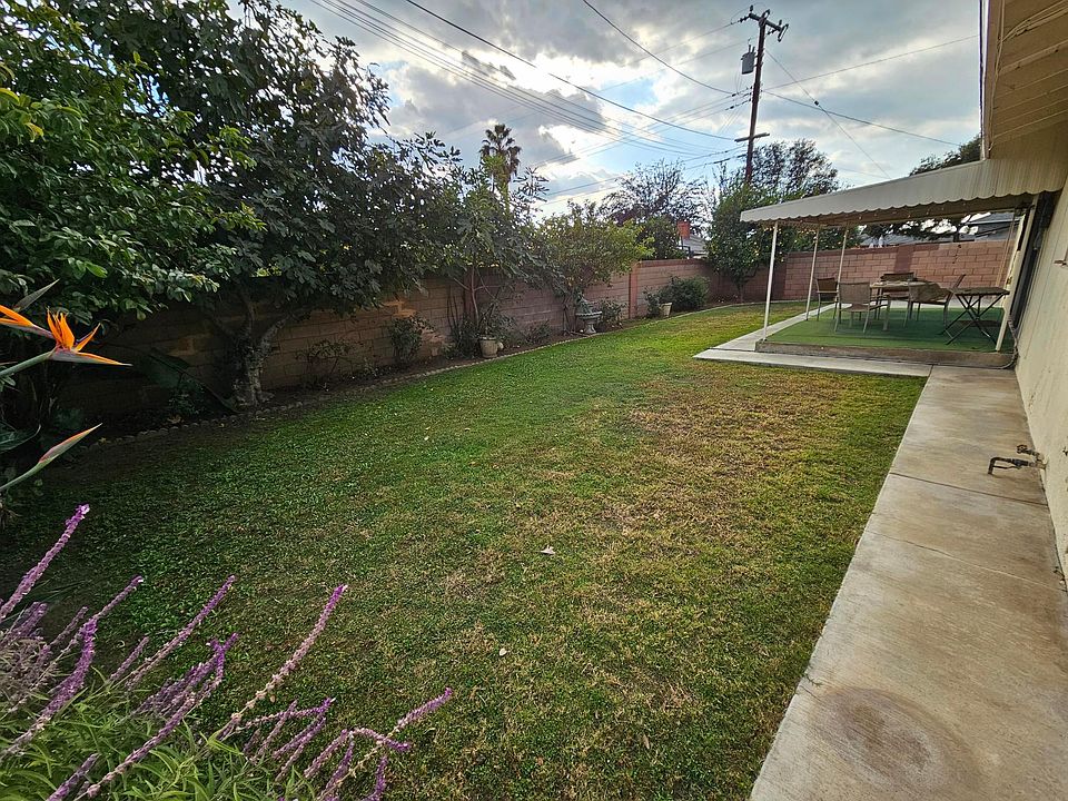 Beautifully landscaped backyard and covered Patio area.