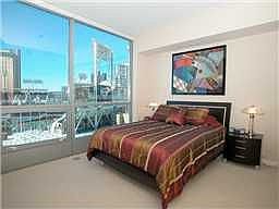 Master with floor to ceiling views of the bay, bridge and Petco Park