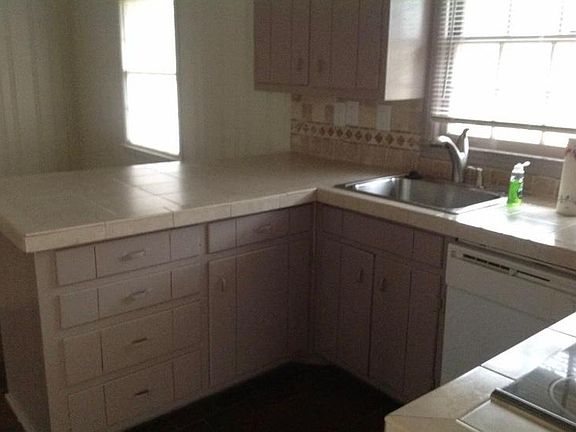 Kitchen with room for a dining room table on other side of counter