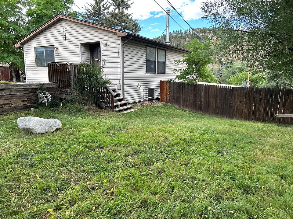 Front yard with fully fenced backyard