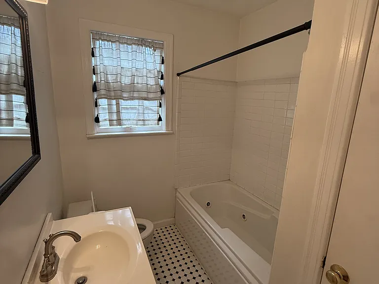 Back bedroom bathroom with soaker tub.