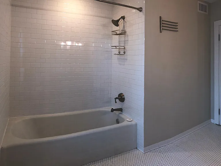 _ Floor to ceiling subway tile , Koehler fixtures, origina