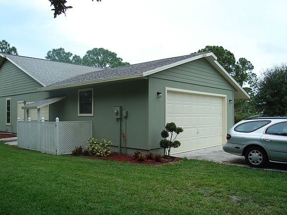 Front facing East 2 Car garage door