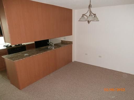 5th image of 9715 Woods Dr #907