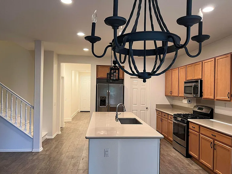 Open Kitchen with updated Countertops and center island.