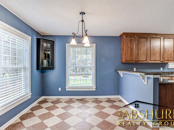 Dining area with built in glass cupboard