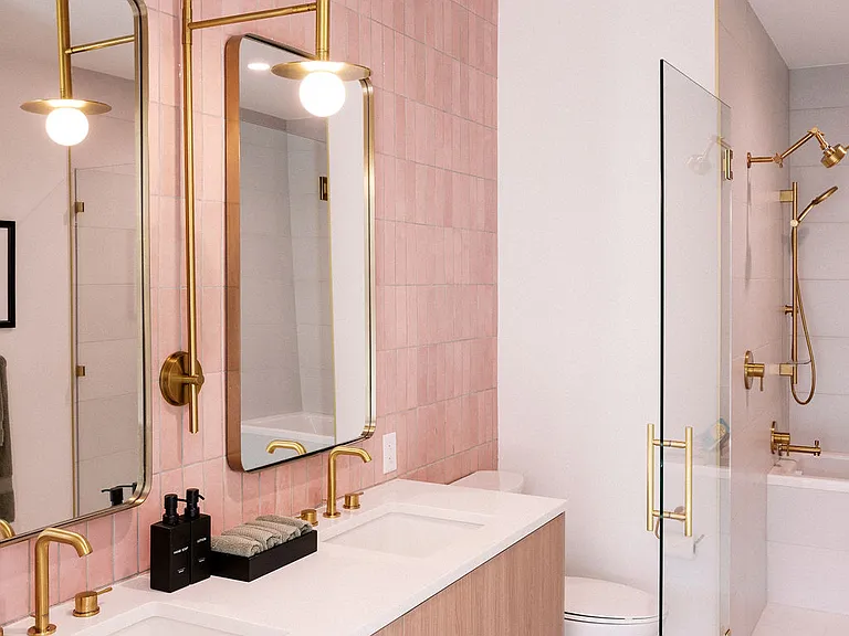 Dual sinks and walk-in shower with tub combo