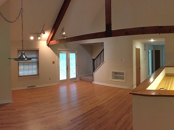 Living room with vaulted ceilings