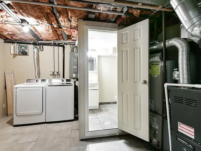 Utility Room/ Laundry Area/ Half Bath Area on Lower Level