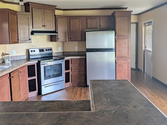 Large kitchen with stainless steel appliances