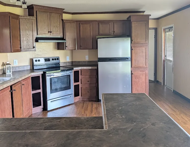Large kitchen with stainless steel appliances