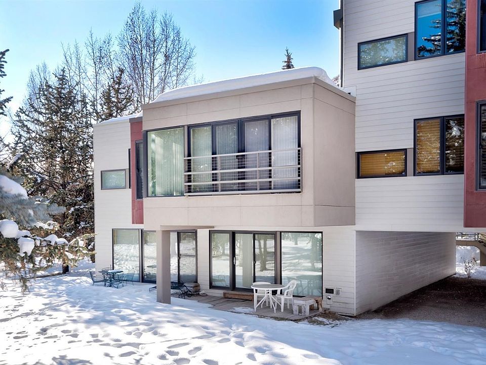 Exterior of unit. Neighbors only on one side! Nice private outdoor space. Great for dogs &/or kids! Easy walk from deck to amenities & walking path....as a short-cut!