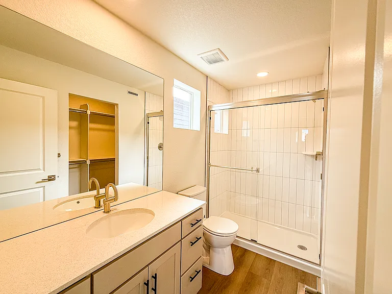 Master Bathroom - Three full bathrooms with modern fixtures and clean, contemporary finishes.