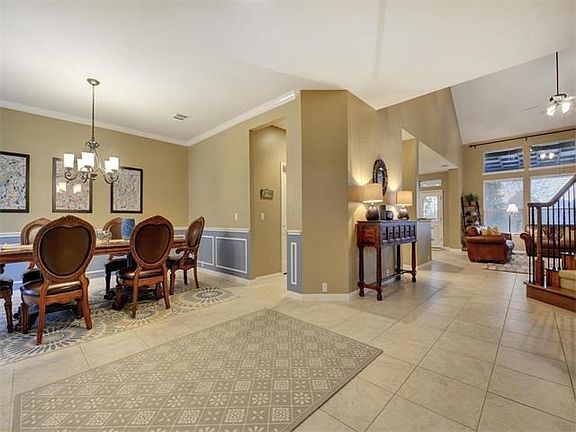 Easy flow from the foyer to the formal dining, kitchen and living rooms.