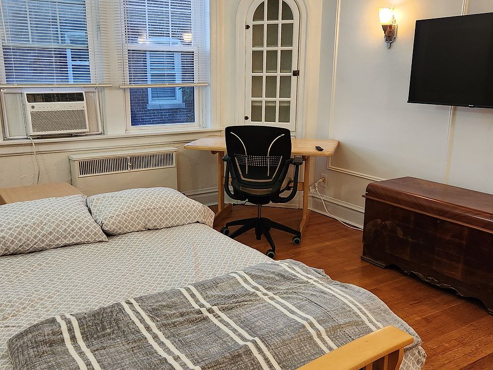 Futon converts to bed. The futon bed contains an additional mattress topper, pillows, and blanket.
